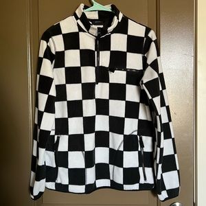 Woman’s Empyre quarter zip sweater.